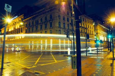 I chose this shot because I wanted to capture the light trails of a bus, mirroring the curved corner of the building.